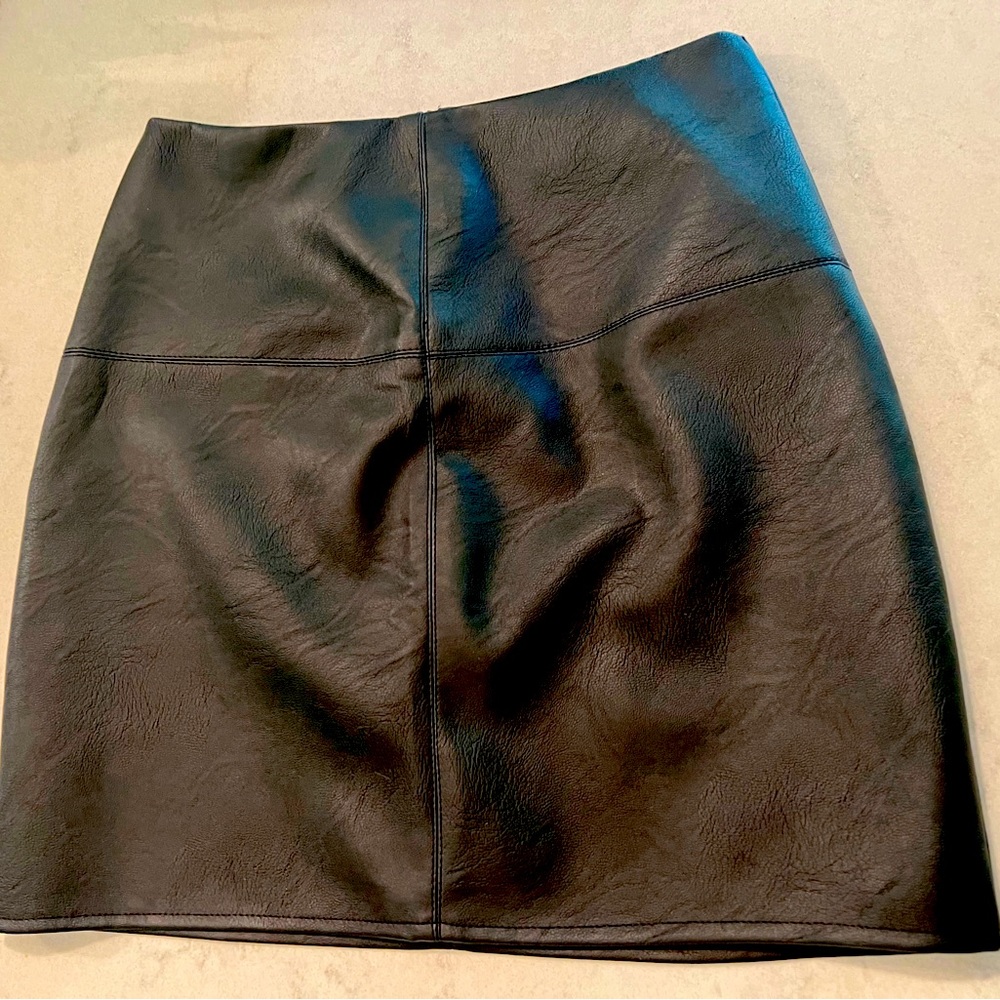 Misguided faux leather skirt. New with tags . Size 2.